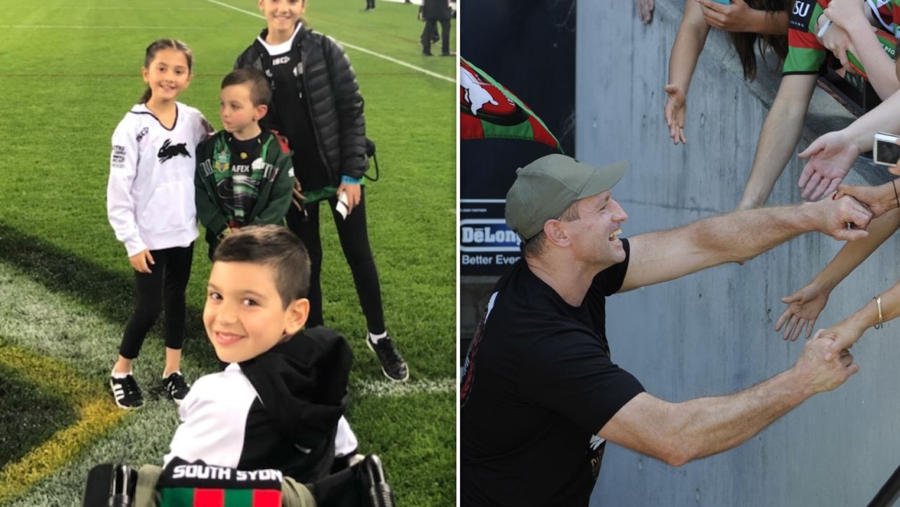 Michael Maguire and a young South Sydney fan.