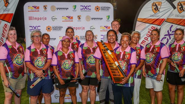 Golden Sistas posing with their trophy after taking out the grand final. Picture: Charlie Lowson/NT Cricket.