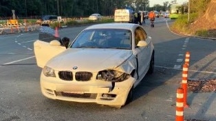 A white sedan at the scene of the double fatality on Nambour Connection Rd on Thursday