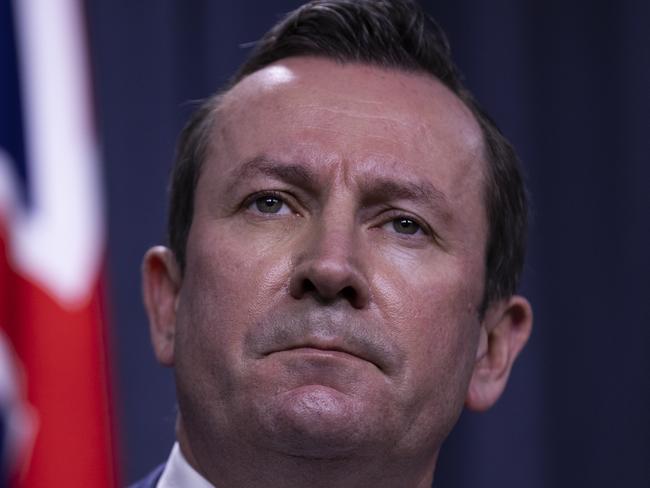 PERTH, AUSTRALIA - JUNE 29: West Australian Premier Mark McGowan speaks to media at Dumas House on June 29, 2021 in Perth, Australia. Lockdown restrictions have come into effect across the Perth and Peel regions for the next four days, following the confirmation of new community COVID-19 cases linked to the highly contagious Delta variant of the coronavirus. From midnight, residents in the Perth and Peel regions are only permitted to leave their homes for essential reasons, including purchasing essential goods, receiving medical care, or caring for the vulnerable. People may leave home to get vaccinated or to exercise within a 5-kilometre radius of their home. Weddings are restricted to five people, funerals to 10 people while gyms, beauty and hair salons, casinos and nightclubs must close. (Photo by Matt Jelonek/Getty Images)