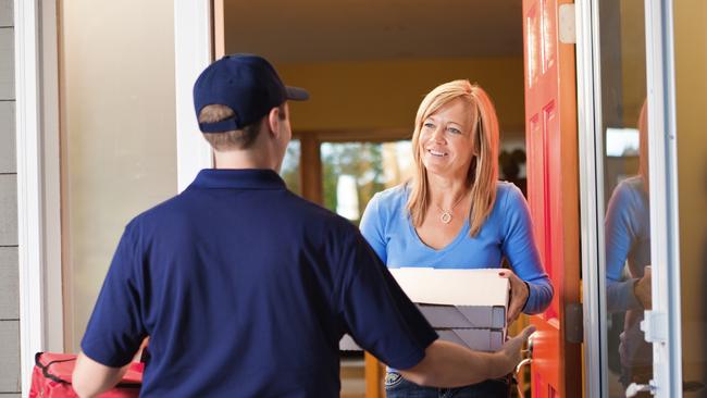 Pizza franchise Dominos has been dealing with a spike in demand for deliveries during the COVID-19 pandemic. Picture: iStock.