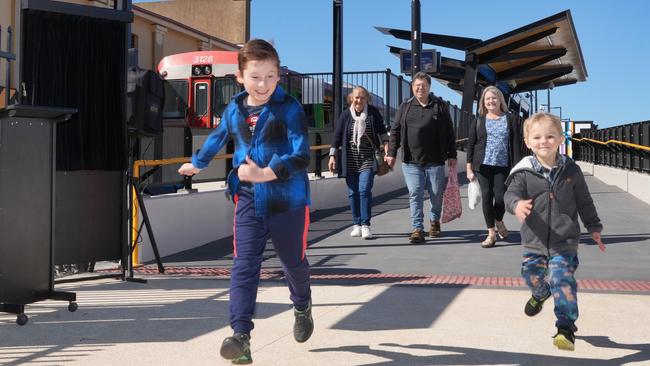 Stanley,4, and family friend Jacob Webb,10, with former freight train driver, Bruce Domagalski, 72, of Parafield Gardens, wife Theresa and friend Elizabeth Webb of Valley View, there for the Port Dock celebration. Picture: Dean Martin