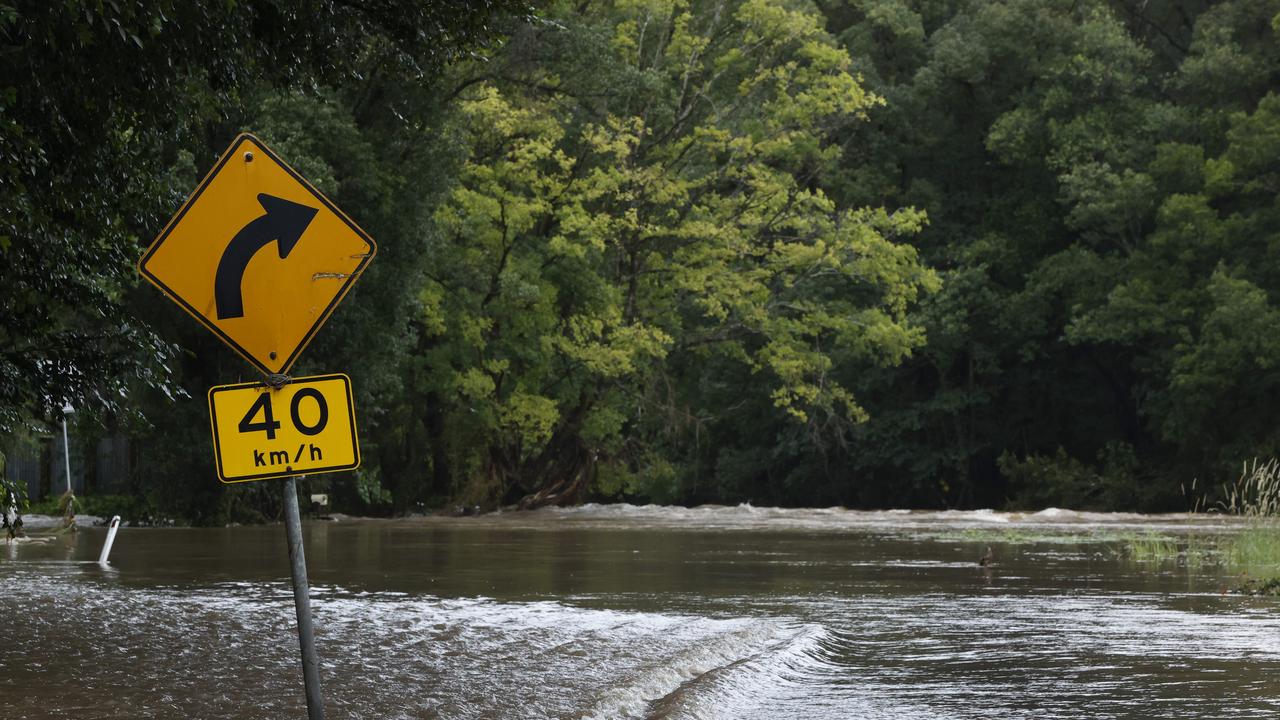 A woman has died after he car was swept away in floodwaters. Picture Lachie Millard