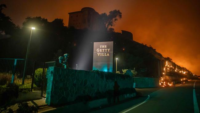 Flames from the Palisades Fire reach the grounds of the Getty Villa Museum on the Pacific Coast Highway on January 8. Picture: Getty Images via AFP