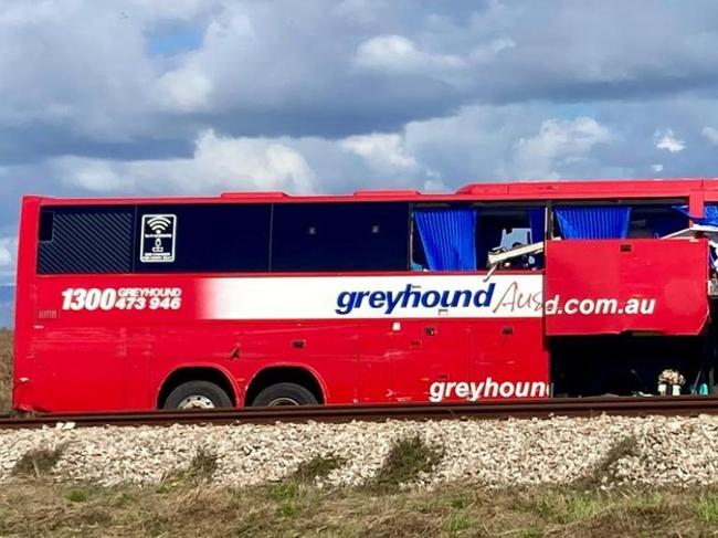 Three people have been killed and seven are fighting for their lives after a horrific crash between a bus and a car towinga caravan. Emergency services were called to the Bruce Highway near Gumlu, in Queensland’s Whitsundays region, just after 11am on Sundayfollowing reports of a serious collision between two vehicles. Picture: Supplied