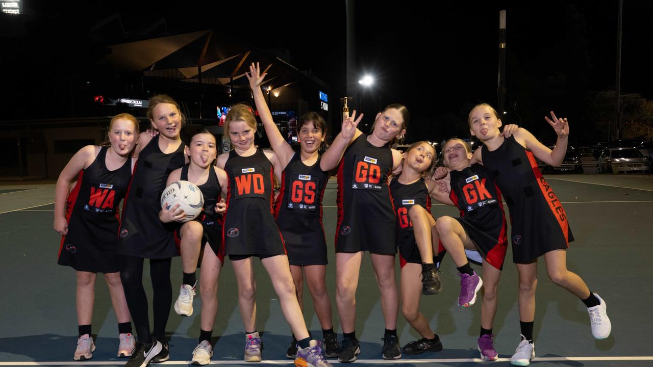 Newtown Kennedy under-11 netball team pull their funniest faces.