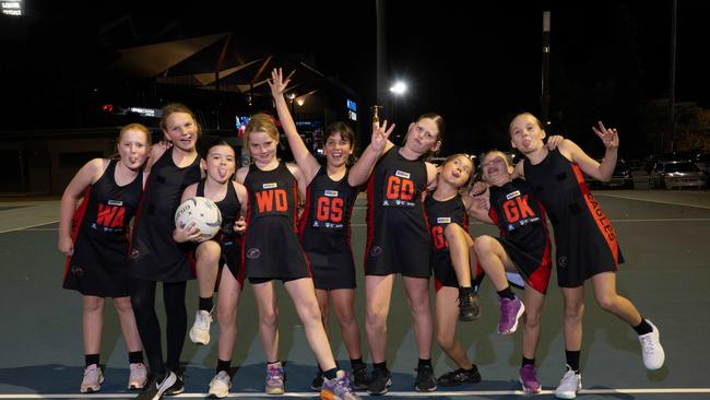 Newtown Kennedy under-11 netball team pull their funniest faces.