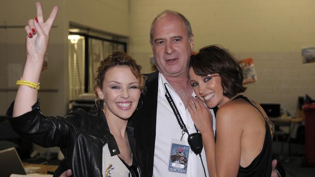 Kylie and Dannii Minogue with Michael Gudinski at Sound Relief Bushfire Benefit Concert in 2009. Picture: Martin Philbey/Redferns