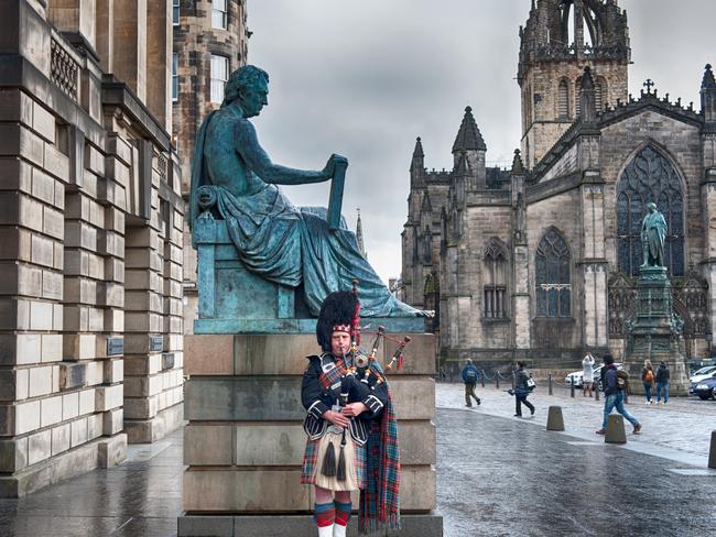 A piper on the Royal Mile in Edinburgh.