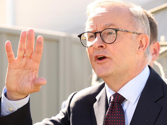 FEDERAL ELECTION TEAM 2022. LABOR BUS TOUR 3/5/2022. Labor leader Anthony Albanese during a press conference under a Hills Hoist, East Gosford in the seat of Robertson NSW. Accompanied by LaborÃs Gordon Reid, Jason Clare, Emma McBride. Picture: Liam Kidston