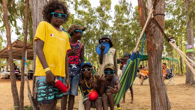 Yolngu children sit in a hammock during the Garma Festival at Gulkula. Picture: Tamati Smith/ Getty Images