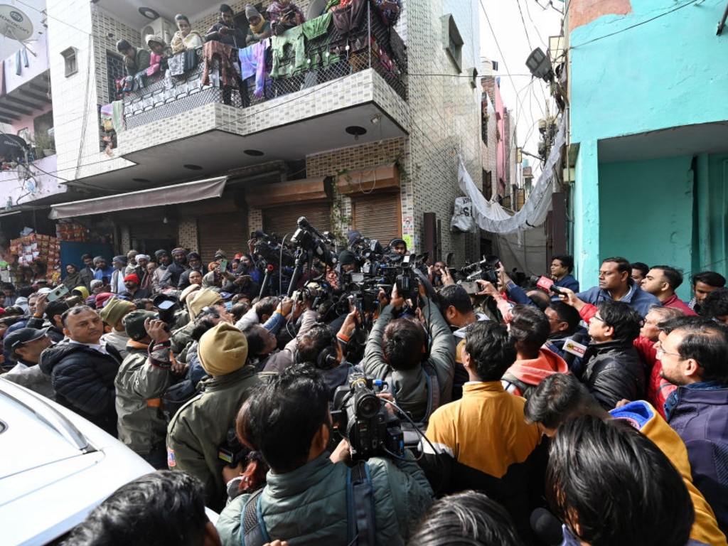 A crowd of people gathered outside the residence of Anjali Singh after her tragic death.