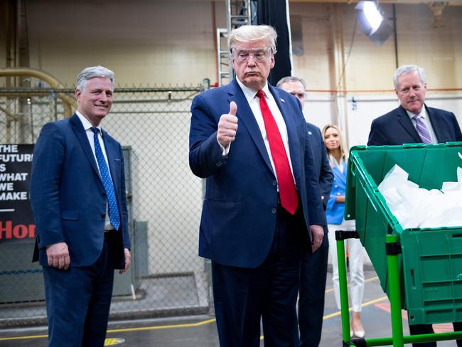 US President Donald Trump tours a Honeywell International Inc. factory producing N95 masks during his first presidency. Picture: AFP