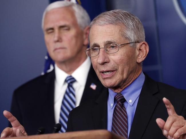 Dr. Anthony Fauci, director of the National Institute of Allergy and Infectious Diseases, speaks as Vice President Mike Pence listens. Picture: AP Photo