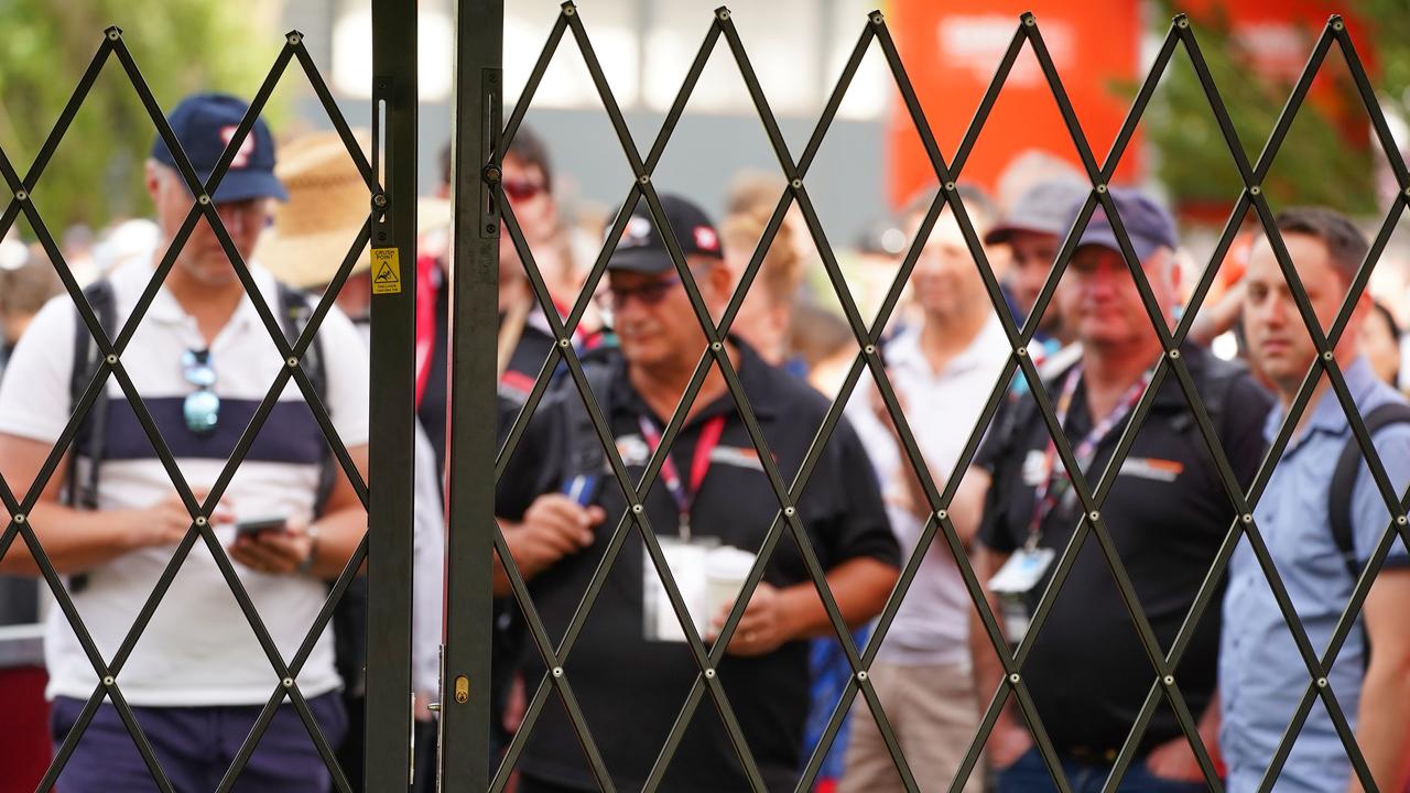 Spectators queue at the gate to gain entry in Melbourne.