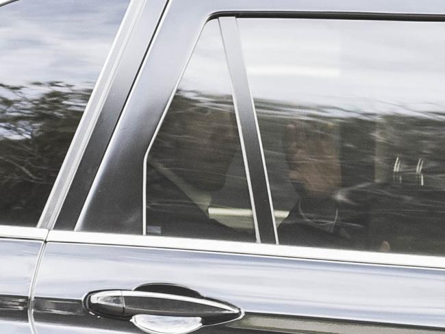 Barack Obama waves to onlookers after arriving at Sydney Airport. Picture: Darren Leigh Roberts