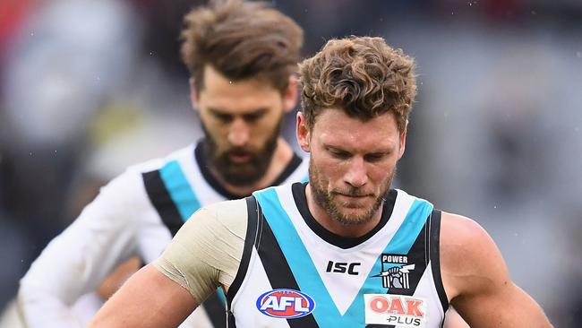 Brad Ebert and Justin Westhoff show their disappointment after losing to Collingwood on Saturday. Picture: Quinn Rooney/Getty Images)