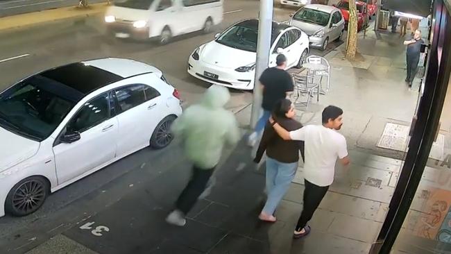 CCTV captured the moment a man was stabbed in the leg outside Yankees Burger Bar on King St in Melbourne. Picture: Supplied