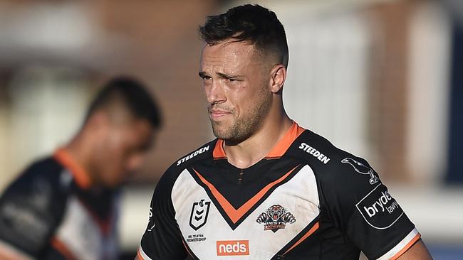 ROCKHAMPTON, AUSTRALIA - AUGUST 21:  Luke Brooks of the Tigers looks dejected after losing the round 23 NRL match between the Wests Tigers and the Cronulla Sharks at Browne Park, on August 21, 2021, in Rockhampton, Australia. (Photo by Ian Hitchcock/Getty Images)