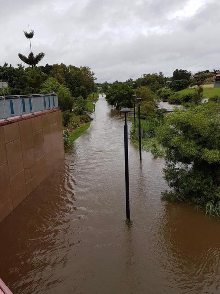 Kedron Brook overflowed near the Kedron Brook busway station. Photo: Bronwyn Jobson