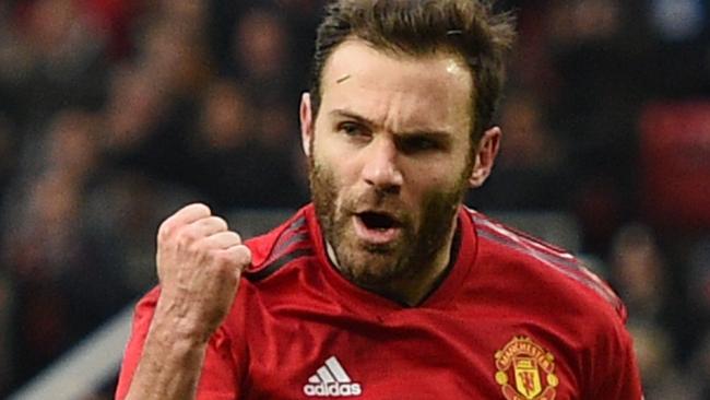 Manchester United's Spanish midfielder Juan Mata celebrates scoring the opening goal during the English FA Cup third round football match between Manchester United and Reading at Old Trafford in Manchester, north west England, on January 5, 2019. (Photo by Oli SCARFF / AFP) / RESTRICTED TO EDITORIAL USE. No use with unauthorized audio, video, data, fixture lists, club/league logos or 'live' services. Online in-match use limited to 120 images. An additional 40 images may be used in extra time. No video emulation. Social media in-match use limited to 120 images. An additional 40 images may be used in extra time. No use in betting publications, games or single club/league/player publications. /