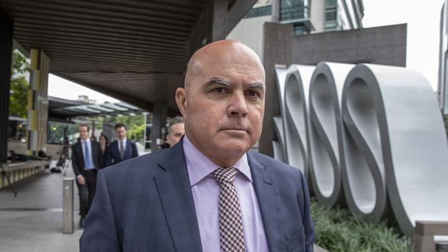 Rabobank's Bradley James leaves the Brisbane Magistrate Court in Brisbane earlier today. Picture: AAP