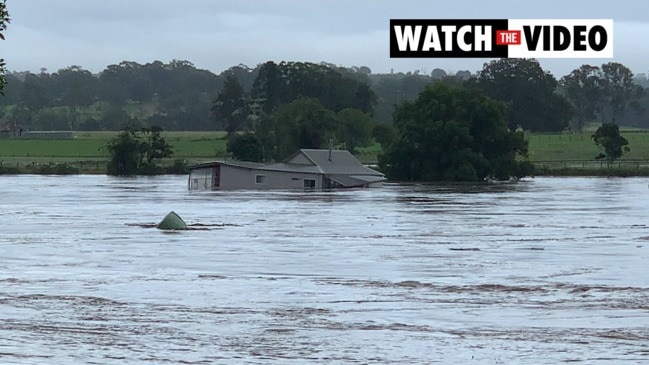 House swept away in floodwaters in West Taree