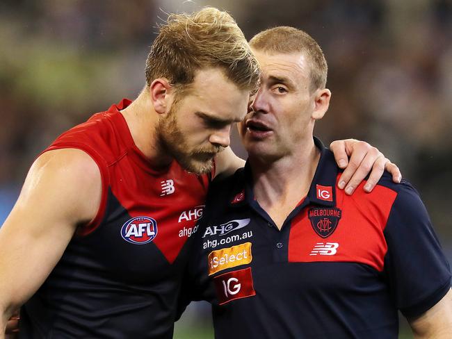 AFL Round 12. Melbourne vs. Collingwood at the MCG. Melbourne coach Simon Goodwin talks with Jack Watts at 3 qtr time  . Pic: Michael Klein