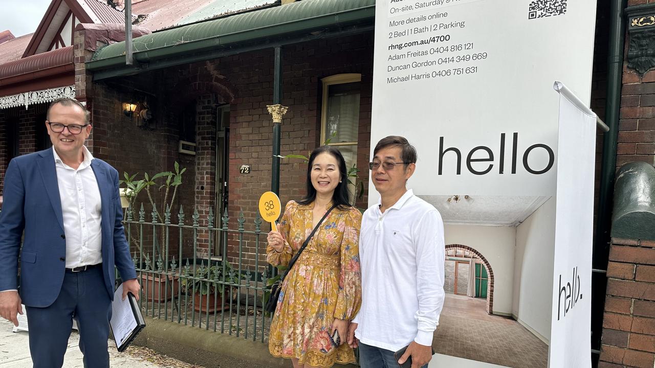 Nina and Jeff Kuo, buyers in Alexandria with agent Duncan Gordon of Raine and Horne. Picture: Stephen Nicholls.