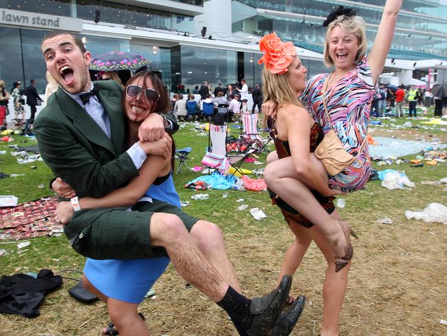 Racegoers pick each other up in 2010.