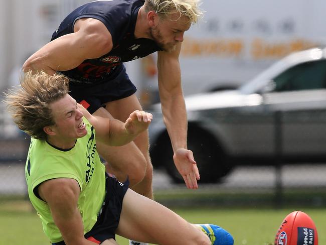 Jack Watts collides with Jayden Hunt. Picture: Wayne Ludbey