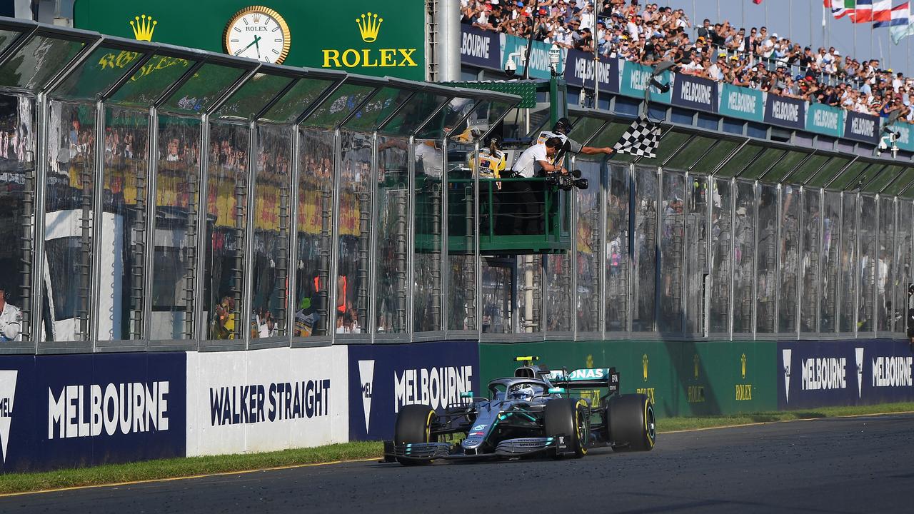 Race winner Valtteri Bottas takes the chequered flag in 2019.