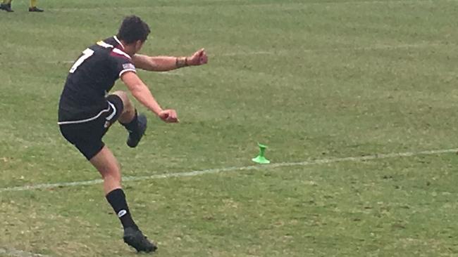 Marsden SHS co-captain and goal-kicker Konrad Tu'ua kicking for goal.