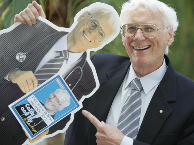 Dr James Wright promoting one of his special Gold Coast Bulletin booklets in 2004. Picture: Richard Webb.