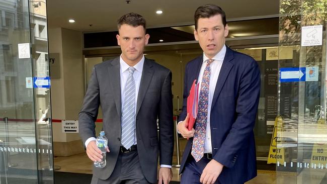 Joch McLean (left) with his lawyer (right) leaving court on March 17, 2023.