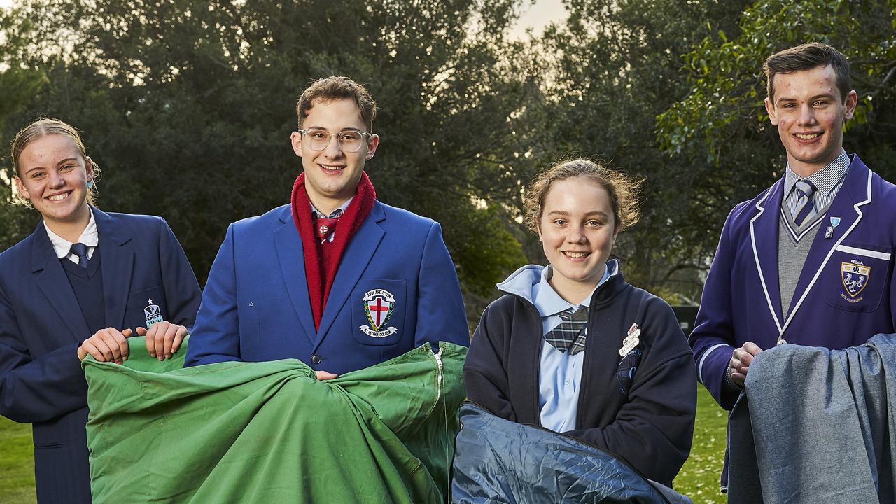 Abby Cenko, 17, Alex Kambanou-Nikolic, 17, Georgia Alexander, 12, and Andre Riccardi, 18 at Veale Gardens in Adelaide, fundraising for the Blanket Appeal. Picture: Matt Loxton