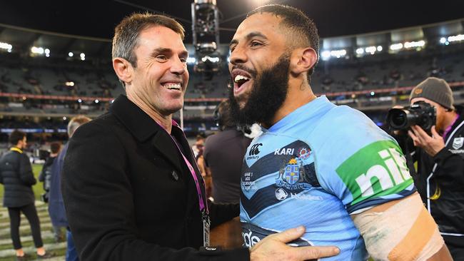 MELBOURNE, AUSTRALIA - JUNE 06:  Blues coach Brad Fittler and Josh Addo-Carr of the Blues  celebrate winning game one of the State Of Origin series between the Queensland Maroons and the New South Wales Blues at the Melbourne Cricket Ground on June 6, 2018 in Melbourne, Australia.  (Photo by Quinn Rooney/Getty Images)