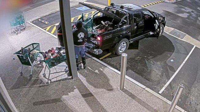 The duo carted $25,000 worth of fragrances into trolleys before they loaded the ute and fled. Picture: Supplied