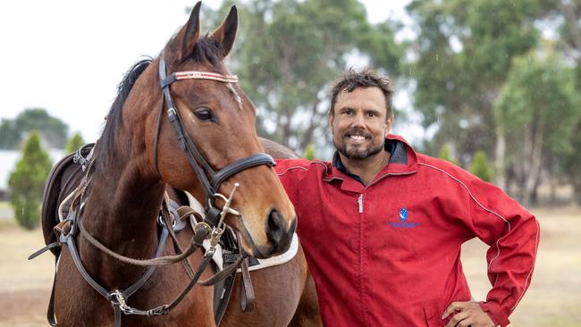 Dan Foster at Riddells Creek Pony Club grounds with his horse named Rambler. Picture: Zoe Phillips