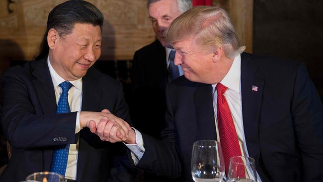 Donald Trump and Xi Jinping during dinner at the Mar-a-Lago estate in 2017. Picture: AFP.