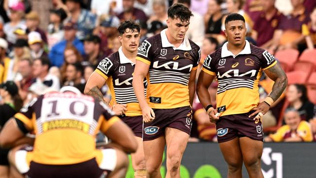 Broncos players (L to R) Kotoni Staggs, Herbie Farnworth and Tesi Niu at full time (Photo by Dan Peled/Getty Images)