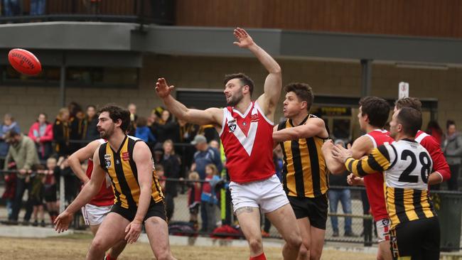 Upwey Tecoma does battle with Healesville on Saturday. Picture: Stuart Milligan