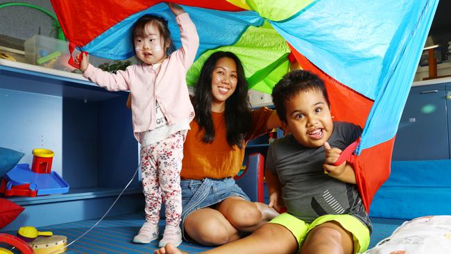 Early Years Special Education teacher Diana Backhouse with Shion 4, and Harrison 5 at Nursery Road State Special School at Holland Park. Picture: Lachie Millard