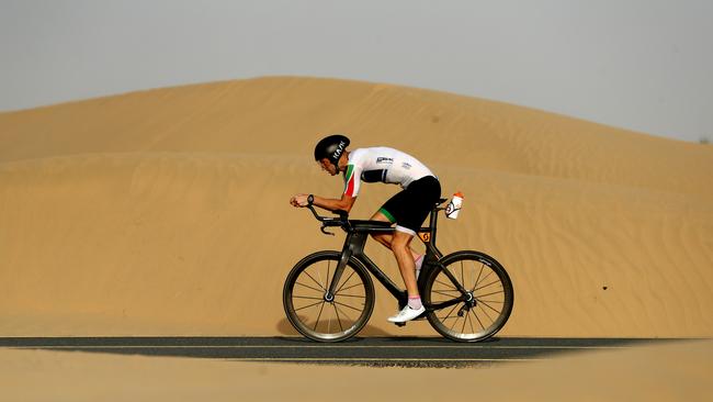 Triathlete Brett Hallam trains at the Al Qudra Cycling Track in Abu Dhabi, United Arab Emirates. Picture: Getty Images