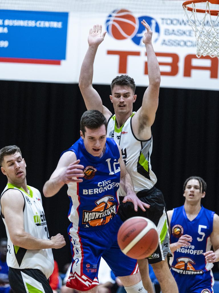 Toowoomba Mountaineers player Patrick Roche (front) and Sebastian Morris of Rip City in Queensland State League Division 1 mens basketball semi-final at USQ's Clive Berghofer Recreation Center, Saturday, July 30, 2022. Picture: Kevin Farmer