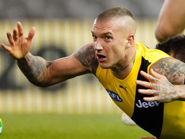 Dustin Martin of the Tigers competes for the ball during the Round 4 AFL match between the St Kilda Saints and the Richmond Tigers at Marvel Stadium in Melbourne, Saturday, June 27, 2020. (AAP Image/Scott Barbour) NO ARCHIVING, EDITORIAL USE ONLY