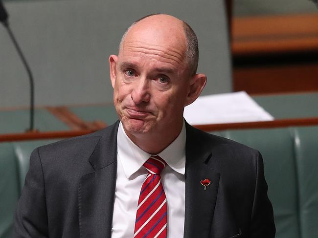 Stuart Robert getting emotional as he speaks in the House of Representatives Chamber at Parliament House in Canberra. Picture Kym Smith