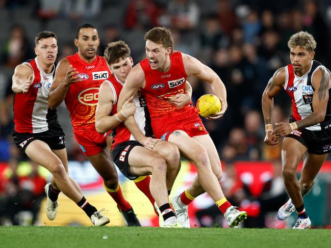 Paddy Dow tackles Noah Anderson. Picture: Michael Willson/AFL Photos