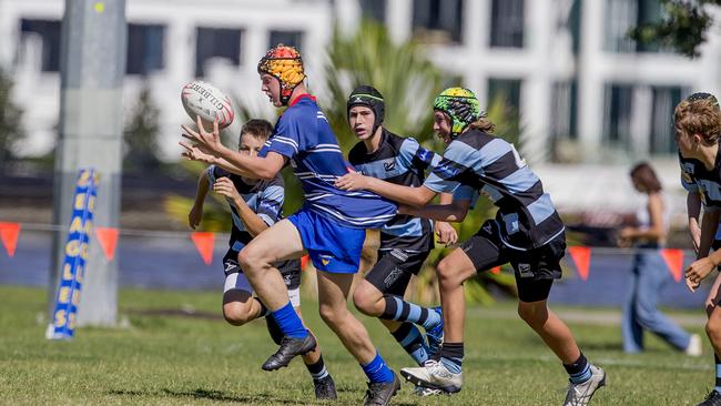 Day One of King of the Country rugby tournament at James Overell Park, Southport. Maroochydore Swans U14s' ( big stripes - blue) in action against USQ Saints U14s' (darker blue small stripes). USQ Saints U14's Tyson Harper . Picture: Jerad Williams