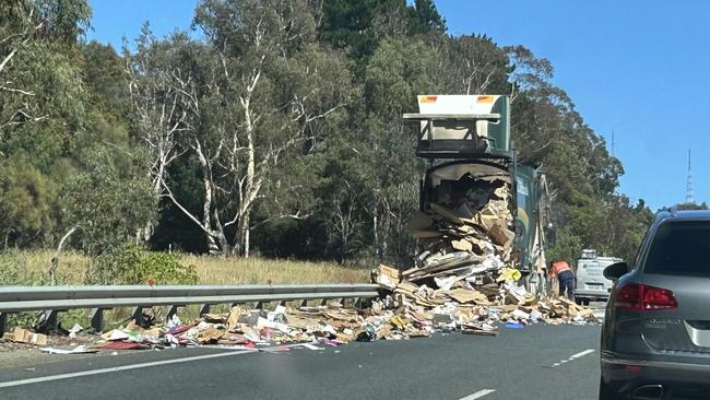 A rubbish truck dumped its contents by the Hahndorf exit on the South Eastern Freeway in the Adelaide Hills.